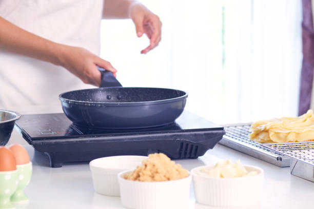istock Womon are making candy in the kitchen. 1159213866