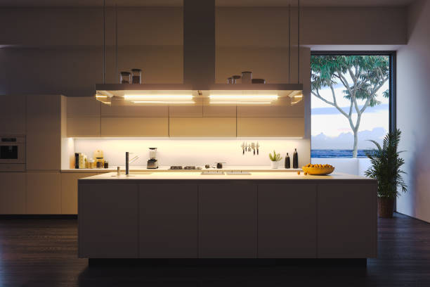 istock Interior of bright modern stylish kitchen with big windows and table. 3d rendering. Evening time. 1159216937