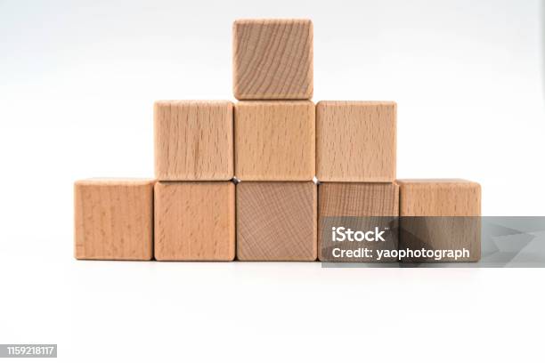 Wood Cube Arrange In Pyramid Shape Business Concept Stock Photo - Download Image Now