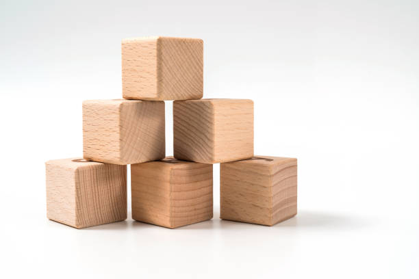 istock wood cube arrange in pyramid shape ,business concept 1159218278
