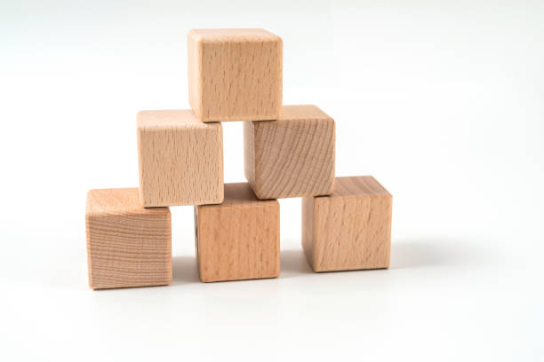 istock wood cube arrange in pyramid shape ,business concept 1159218456