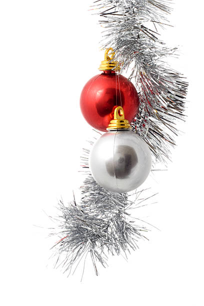 Silver tinsel and red and silver (rather tacky and cheap) Christmas ornaments