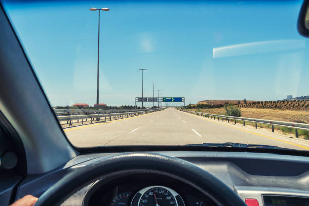 istock View from the car cab, driving on the highway 1159221281