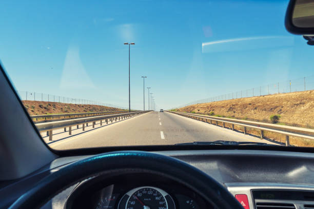 istock View from the car cab, driving on the highway 1159221916