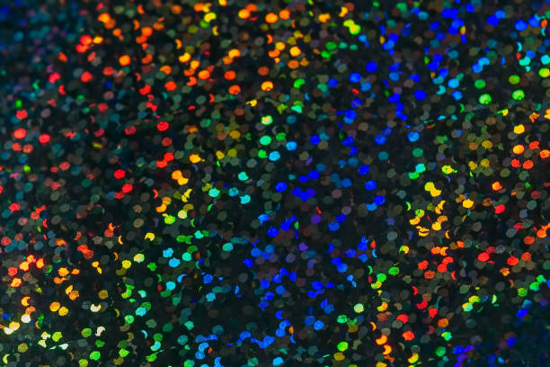 istock Bokeh, abstract background from a placer of brilliant sparkles. multi-colored sparkles with deep shadows. 1159221990