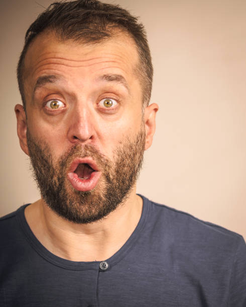 istock Astonished shocked adult man 1159225404