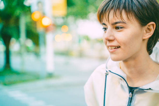 Portrait of a casual young girl at the street stock photo