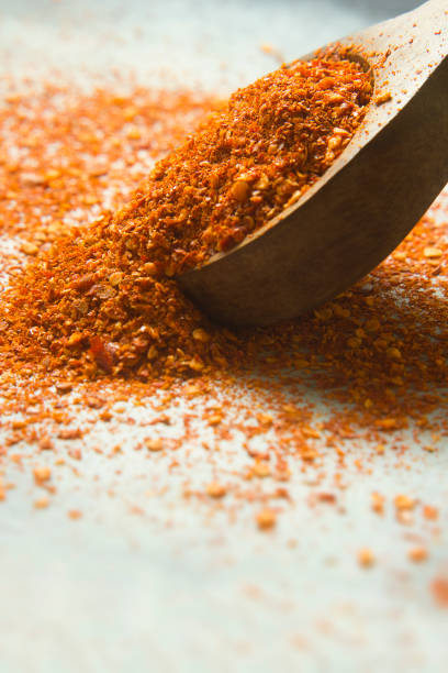 istock Spoon of chili powder 1159228123