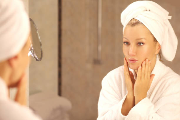 istock Magic anti-aging cream.Applying the cream 1159229865