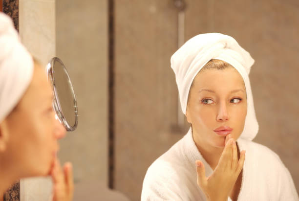 istock Magic anti-aging cream.Applying the cream 1159229868