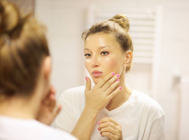 istock Magic anti-aging cream.Applying the cream 1159229875