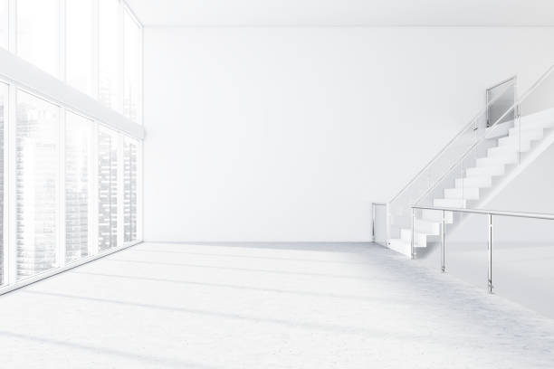 istock Interior of white industrial room with staircase 1159231689