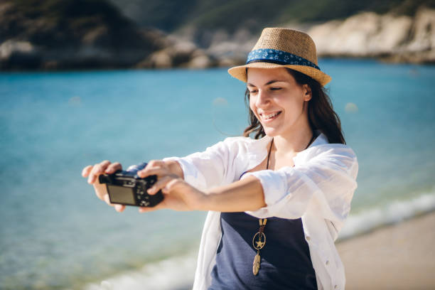 istock Selfies by the sea 1159231702