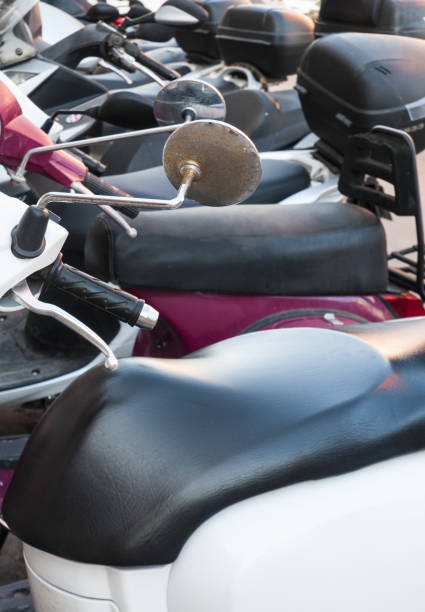 istock Motorcycles parked in a battery very close together 1159235476