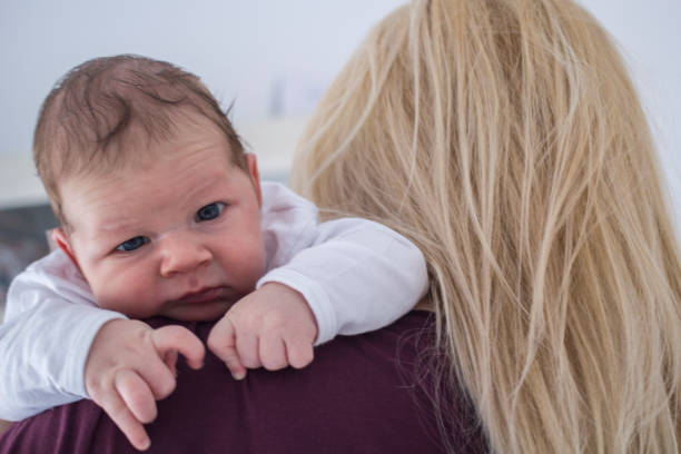 istock Newborn baby boy with his mother 1159240169