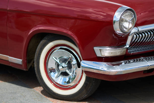 istock Unusual front headlight, old burgundy car 1159241012