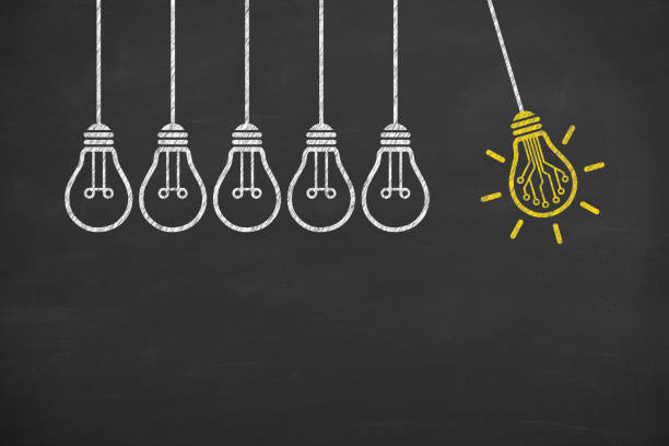 istock Innovative idea concepts with light bulbs on a chalkboard background 1159243670