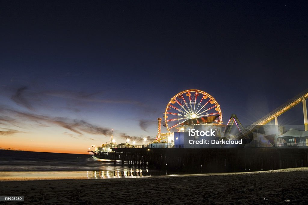 Santa Monica at Twilight Santa Monica Pier just after the sun had set. Just beautiful! History Stock Photo