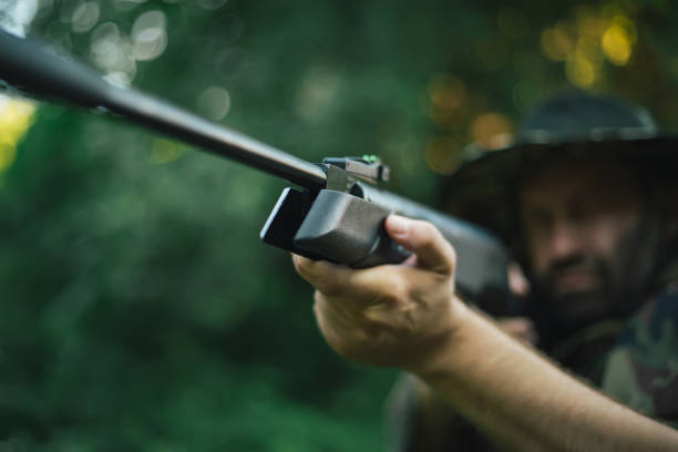 Hunting season begins Hunter, Hunting - Sport, Camouflage, Adult, Men duck with hat stock pictures, royalty-free photos & images