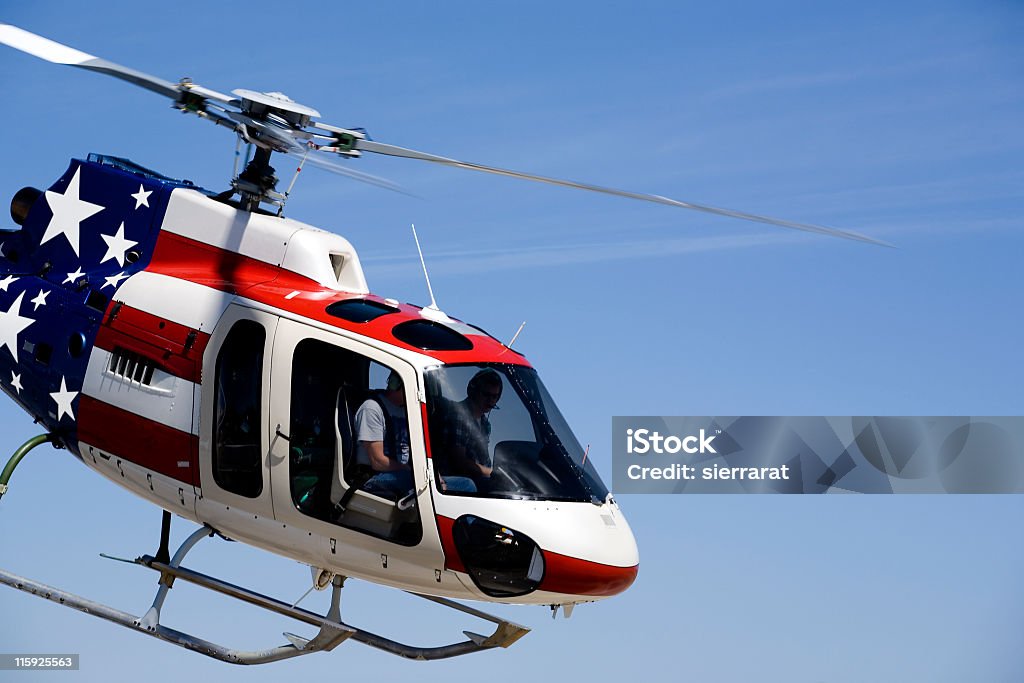 Astar Helicopter Bell helicopter with a stars and stripes paint scheme.   American Flag Stock Photo