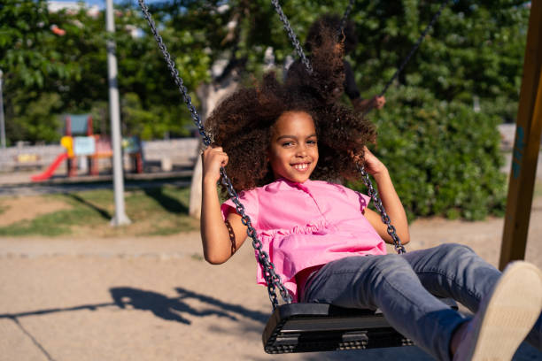 istock Playful girl at a playground 1159259757