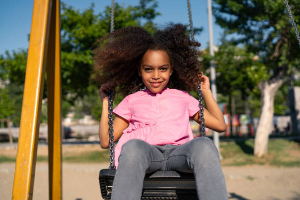 istock Playful girl at a playground 1159259764