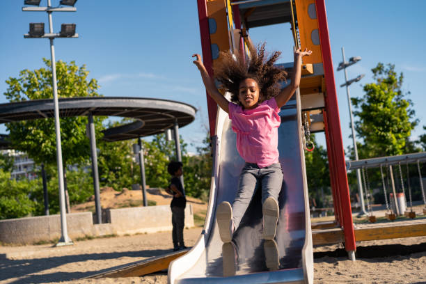 istock Playful girl at a playground 1159259871