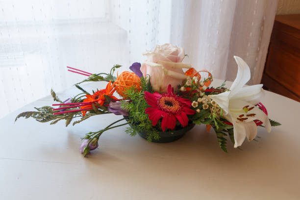 istock Flowers arrangement in a bowl 1159262626