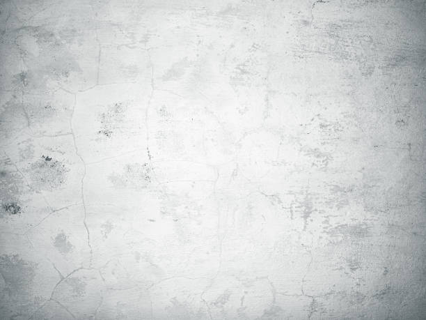 istock Gray painted concrete old cracked wall texture background 1159263212