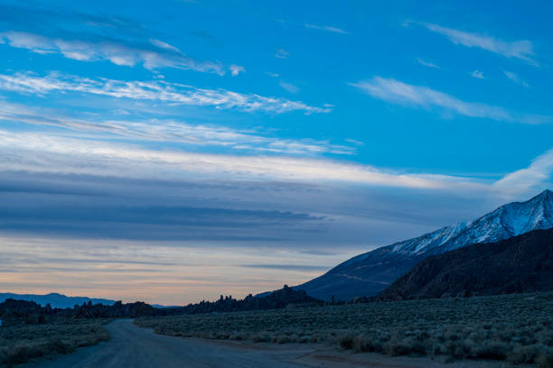 istock Alabama Hills desert rock formations and snowy Sierra Nevada mountain range 1159272443