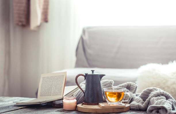Cozy autumn still life with a cup of tea
