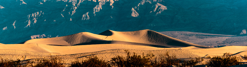 This is a photograph of the scenic Great Sand Dunes National Park desert landscape in Colorado, USA in summer viewed from a high angle view.