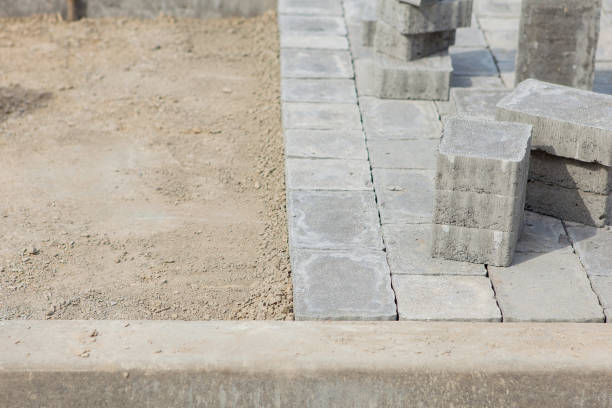 istock Construction of pavement details, cobblestone pavement, stone blocks on road construction site 1159278308
