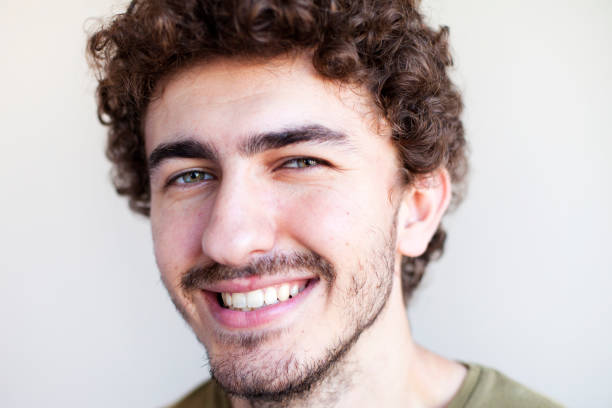 istock Portrait Of Young Handsome Man Smiling 1159289047