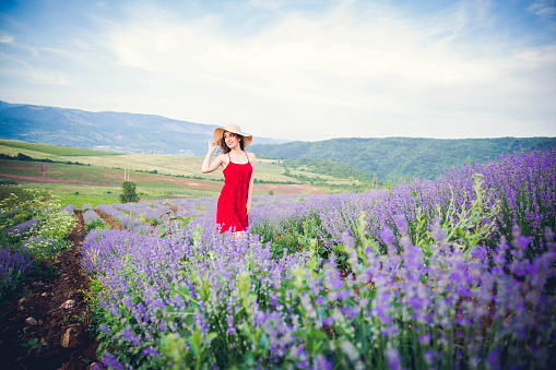 Beautiful woman in lavender field