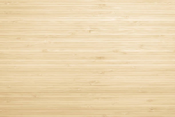 istock Wood texture background in natural light yellow cream color 1159291513
