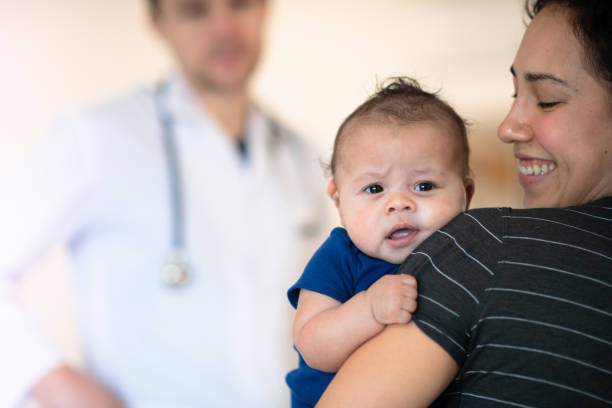 istock Mother holding her toddler 1159291708