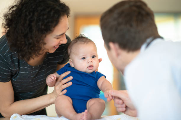 istock Mother holding her toddler 1159291709