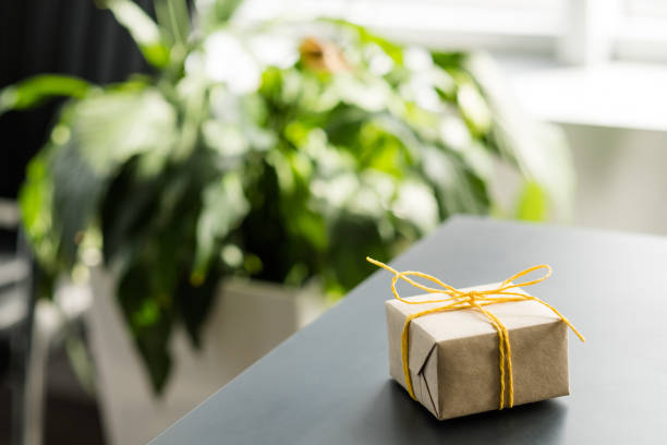 istock office goods delivery wrapped gift box desk 1159292281