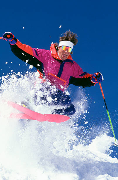 istock Snow Skier Jumping in Powder 115929283