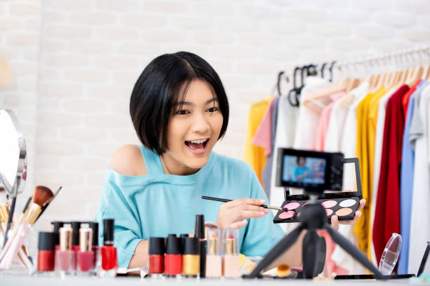 istock Attractive beauty vlogger making video of cosmetics 1159293084