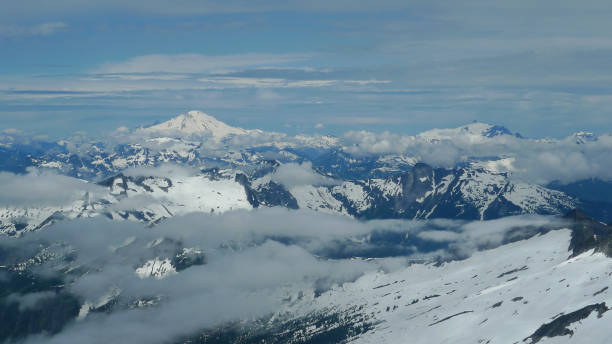 Mt Baker and Mt Shuksan, North Cascades View from Eldorado Peak, North Cascades National Park Washington cascade range north cascades national park mt baker mt shuksan stock pictures, royalty-free photos & images