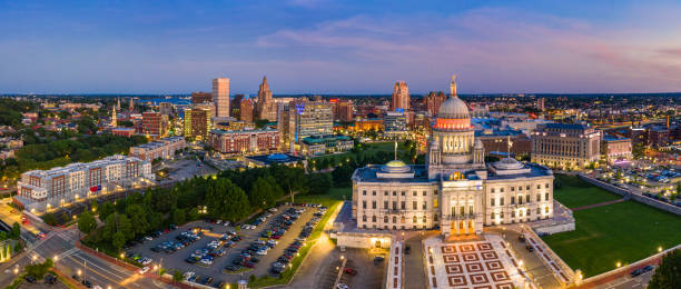 Aerial panorama of Providence, Rhode Island Aerial panorama of Providence skyline and Rhode Island capitol building at dusk. Providence is the capital city of the U.S. state of Rhode Island. Founded in 1636 is one of the oldest cities in USA. rhode island photos stock pictures, royalty-free photos & images