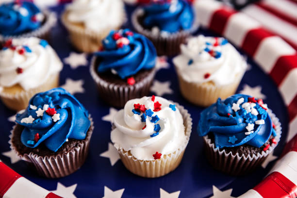 istock Cupcakes for 4th of July party, background for design, selective focus 1159301080