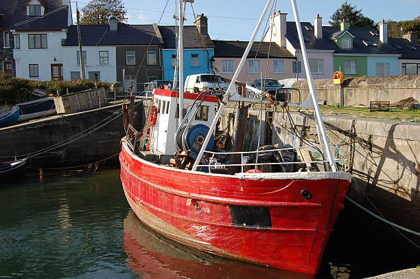 Red fishing boat stock photo
