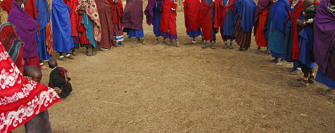 Masai women standing in a circle and are  gathering together in the kraal to dance,Tanzania.