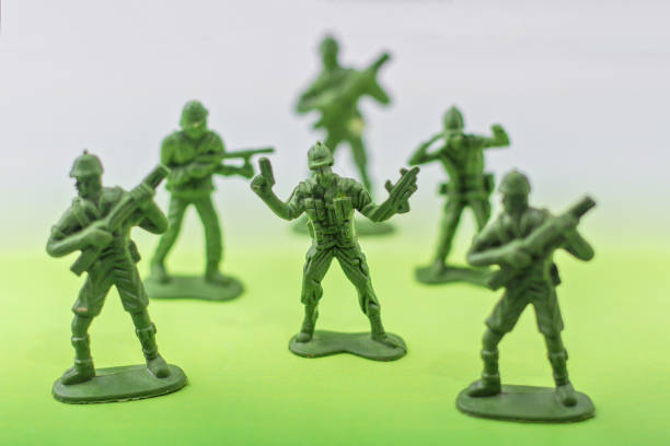 istock toy soldiers on green background 1159306140