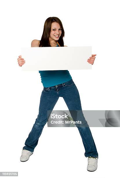 Attractive Teenage Girl Holding Blank Sign Isolated On White Background Stock Photo - Download Image Now
