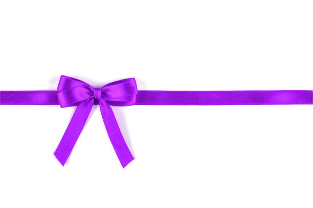 istock Shiny purple silk ribbon on white background. 1159319692
