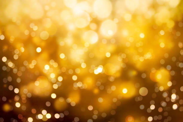 istock gold color bokeh background 1159331145